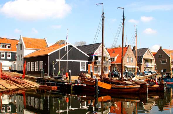 Beeld bij De eerste woningen van Flevoland